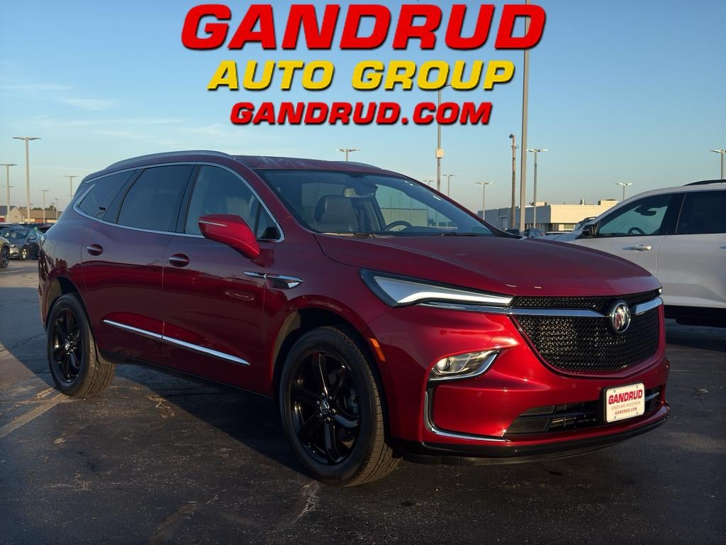 2023 Buick Enclave Essence AWD in Cherry Red Tintcoat — front three-quarter view
